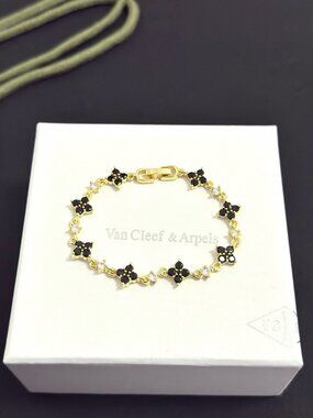 Van Cleef & Arpels 18K Gold Onyx & Diamond Flower Link Bracelet, VCA Alhambra